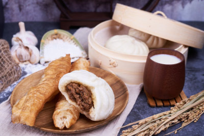 Chinese breakfast: Steamed buns (Baozi), fried breadsticks (yout