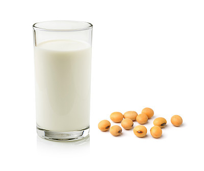 milk with soy beans on white background