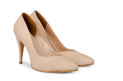 Beige woman shoes isolated on a white