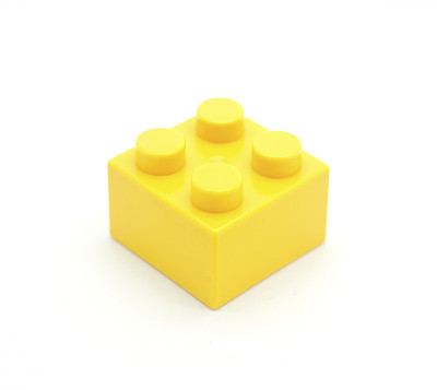 Close-up of yellow plastic Lego block