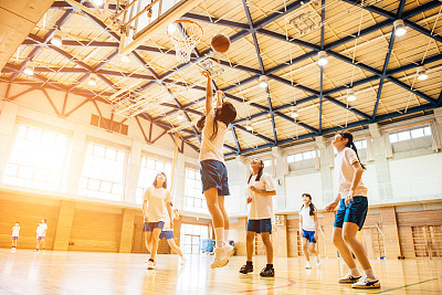 Female Basketball Team Playing in Japanese High School