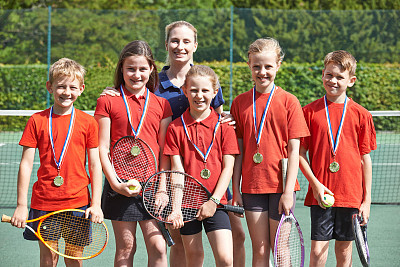 Victorious School Tennis Team With Medals