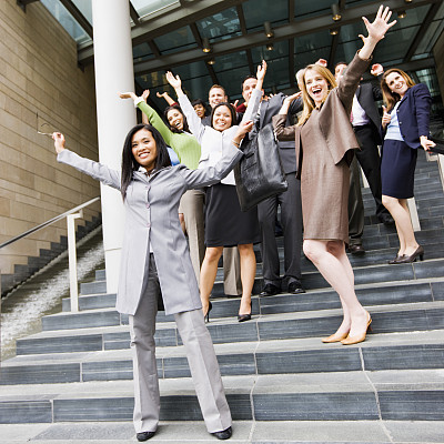 Successful Cheering Business People