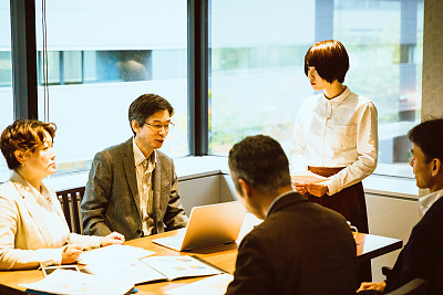 Meeting held in an open office