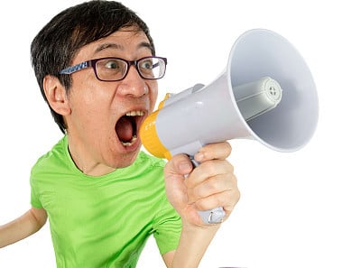 Asian Chinese Man Shouting with a Megaphone