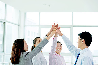 Business people high-five