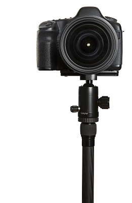 Professional digital camera with wide angle lens on tripod