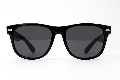 Chic sunglasses with black plastic frame isolated on white background