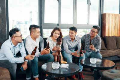 Businesswoman resting with colleagues