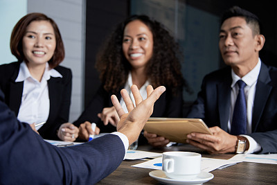 Communicating businesspeople on meeting