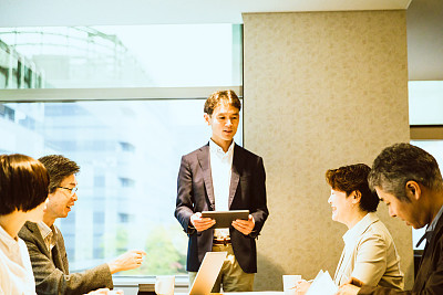 Meeting held in an open office