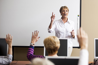 Senior Woman Teaching Adult Learning Class