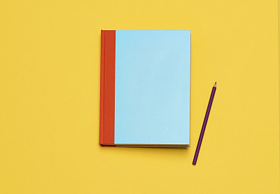 Blue Notebook on Yellow