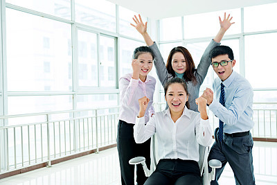 Successful business colleagues celebrating
