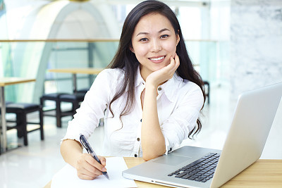 young asian businesswoman with laptop