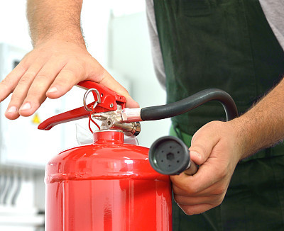 Using of Fire Extinguisher.