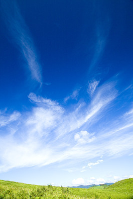 Green hill and cloud
