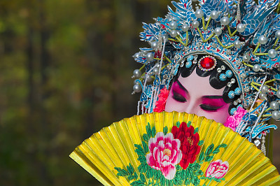 Opera performer in the fall outdoor park, Toronto, Canada