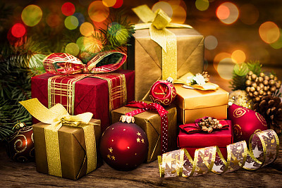 Christmas gifts on the wooden background