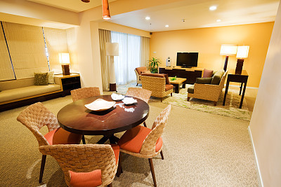 Dining and living rooms in a hotel suite