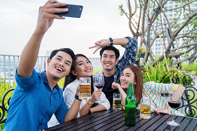 Group of friends taking a selfie together