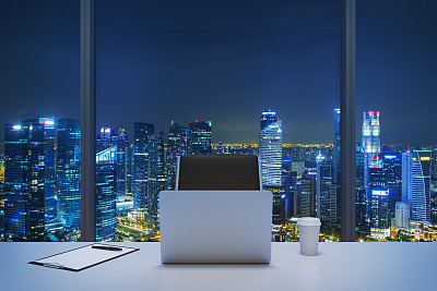 workplace in  panoramic office with New York evening view.