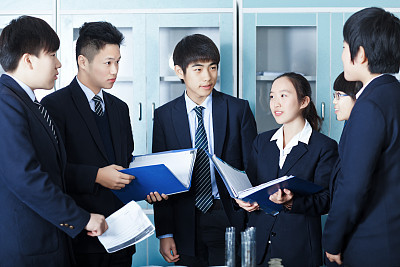 Group of teenage students having a discussion