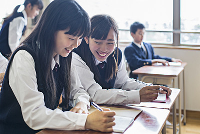 Japanese girls working in the classroom