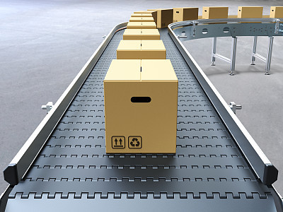 Cardboard boxes on conveyor belt