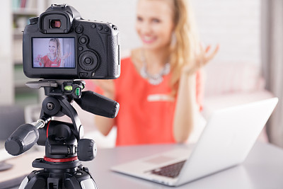 Woman filming her broadcast