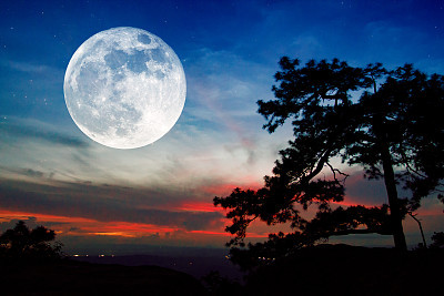 Full moon and sunset on mountain in thailand