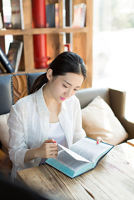 girl in the  bookstore  reading