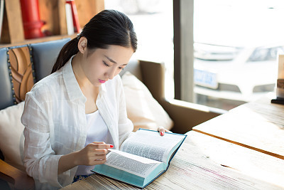 girl in the  bookstore  reading