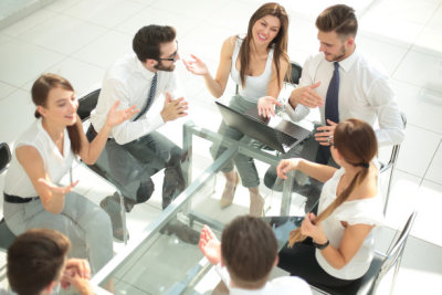 employees of the company discuss new ideas at a business meetin