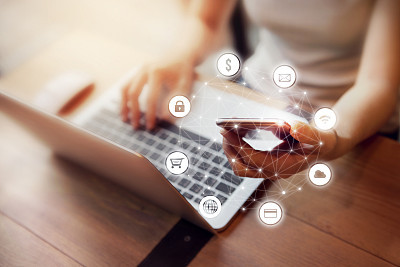 Woman hand using mobile payments online shopping