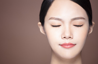 young woman with natural makeup and clean skin