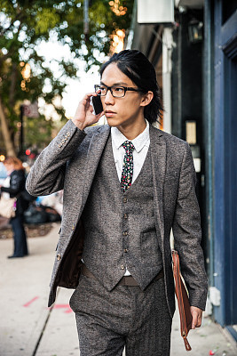 Businessman on mobile in Soho New York