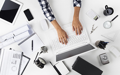 Businesswoman Working At Notebook