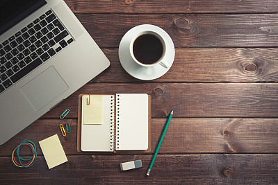 Office supplies on the wooden table