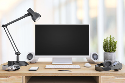 Large PC monitor on an office desk