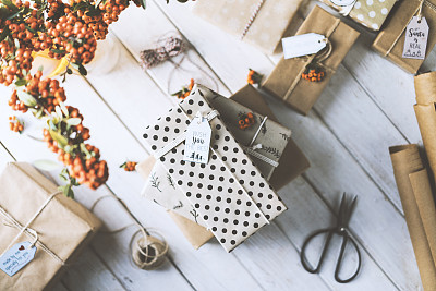 Christmas gifts on wooden table, wish you the best