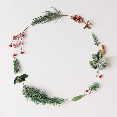 Christmas round frame made of natural winter things.