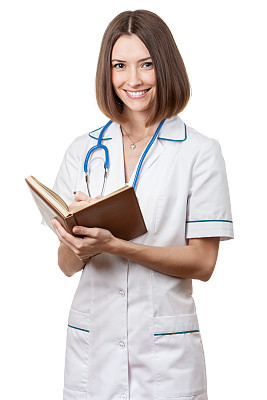 young nurse - beautiful brunette woman medical worker