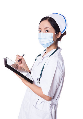 Female nurse writing on pad