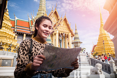 Young tourist traveling in Thai temple