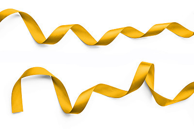 Shiny satin ribbon in bright yellow gold color isolated on white background with clipping path