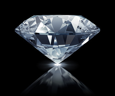 Large clear diamond against black background