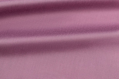 pink background luxury cloth or wavy folds of grunge silk texture satin velvet