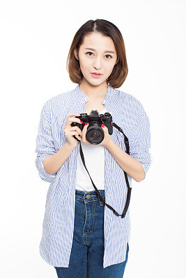 pretty girl holding hands SLR camera