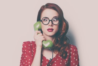 woman with retro phone